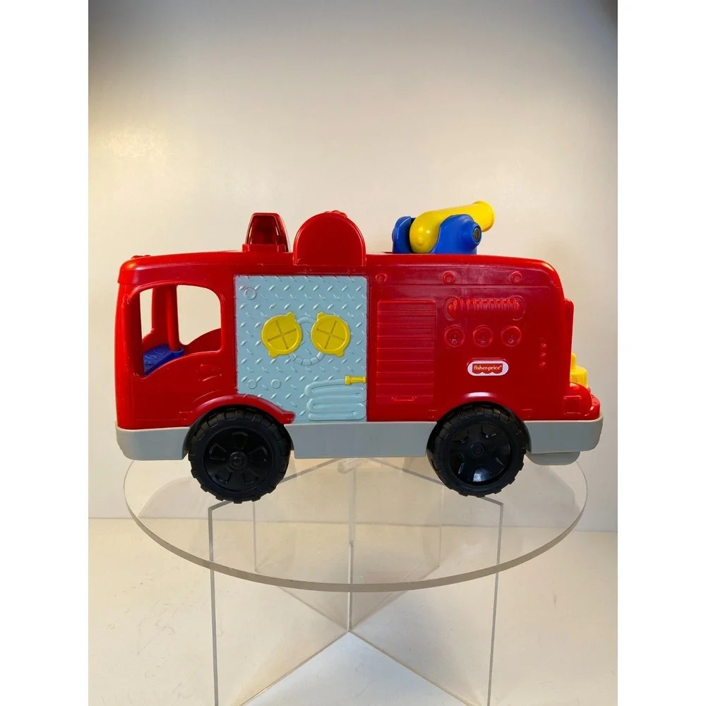 Fisher Price Little People Musical Red Fire Truck Lights Water Hose and Figures